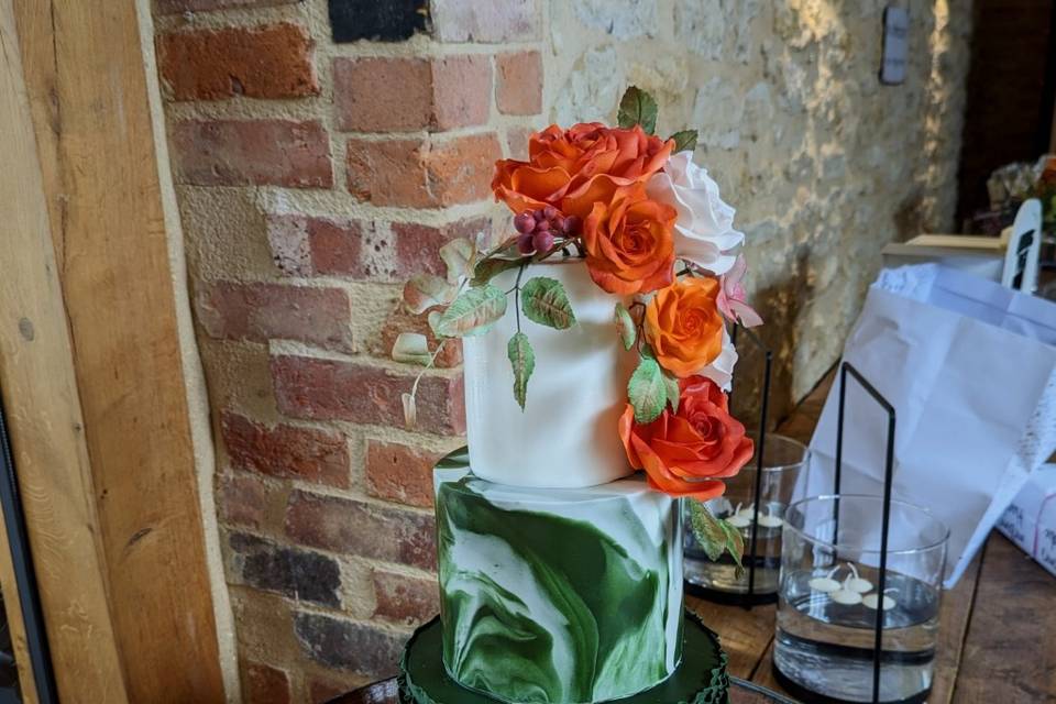 Green and orange wedding cake