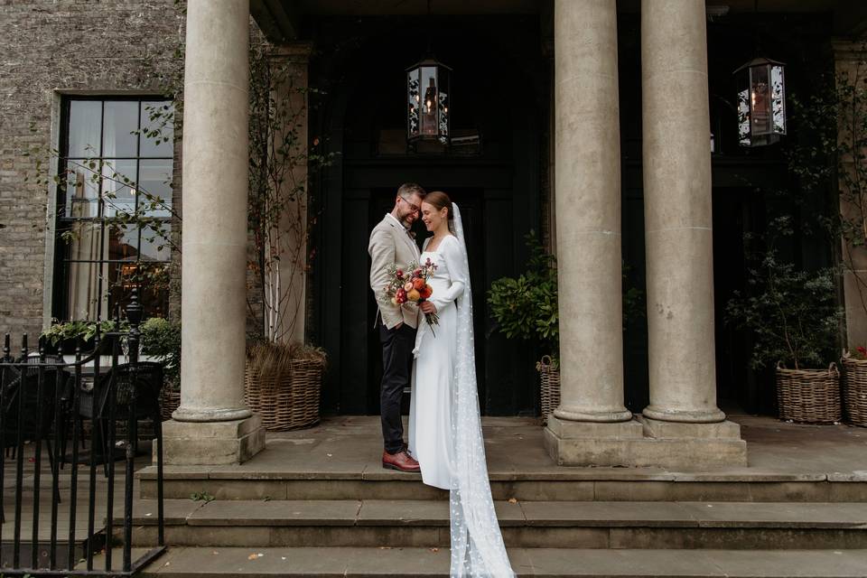 Couple standing on the steps