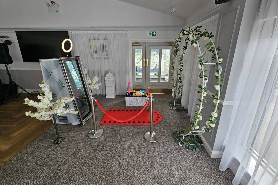 Magic mirror with floral arch