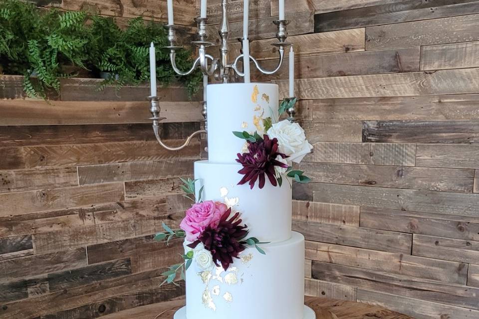 3 tier wedding cake with gold