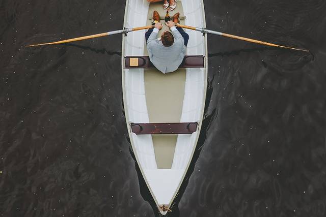 Bride and groom in rowing boat