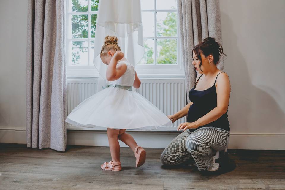 Flower girl twirls in dress