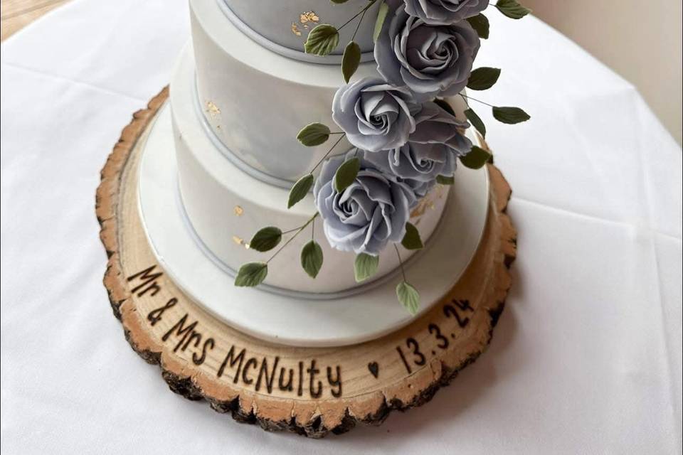 Gold leaf and sugar craft cake