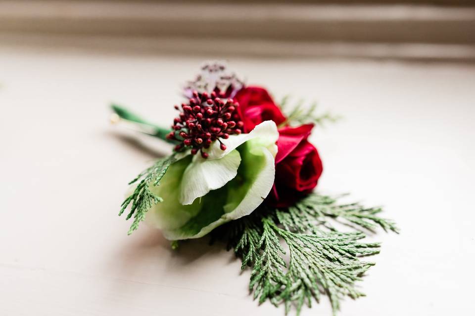 Hellebores and red roses