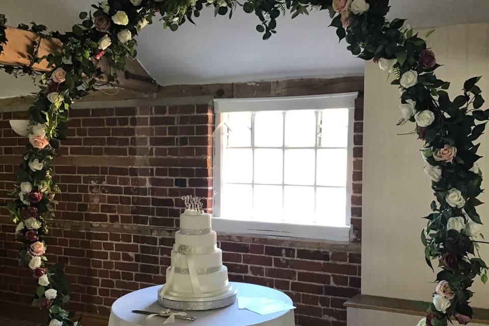 Flower hoop over cake