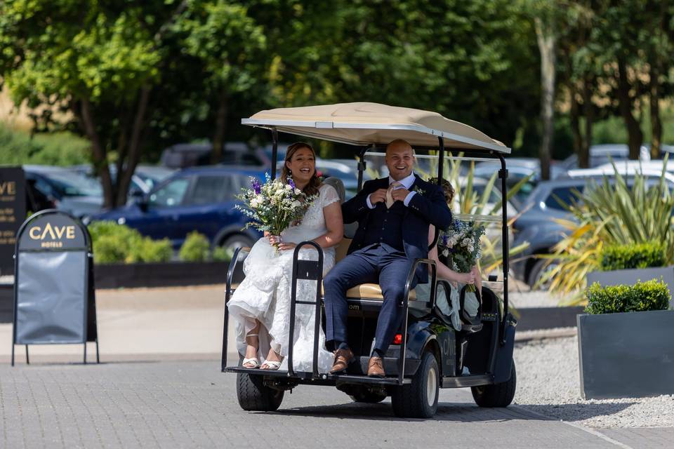 Golf buggy taking the bride