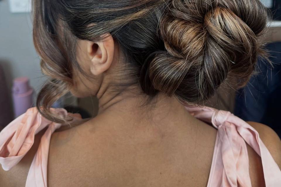 Low classy bun with volume