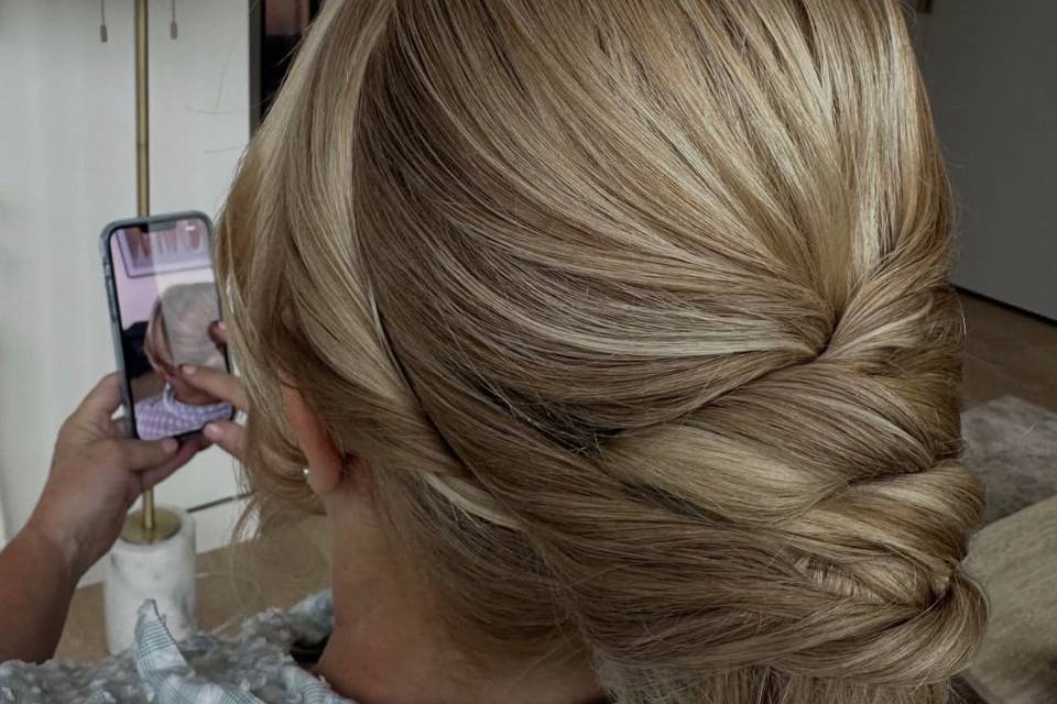 Classic low bun wedding guest