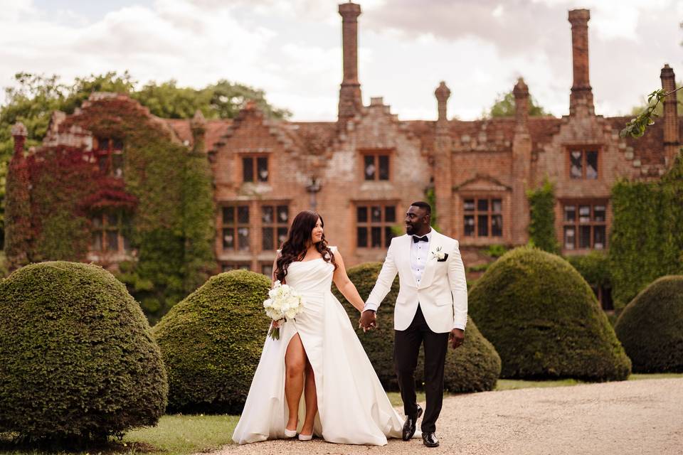 Couple in front house
