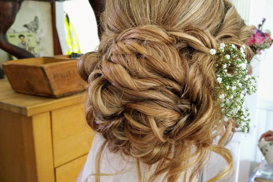 Refined curly updo