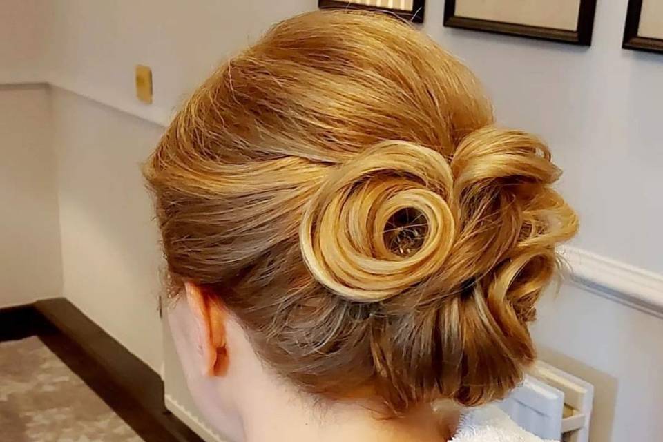 Refined curly updo