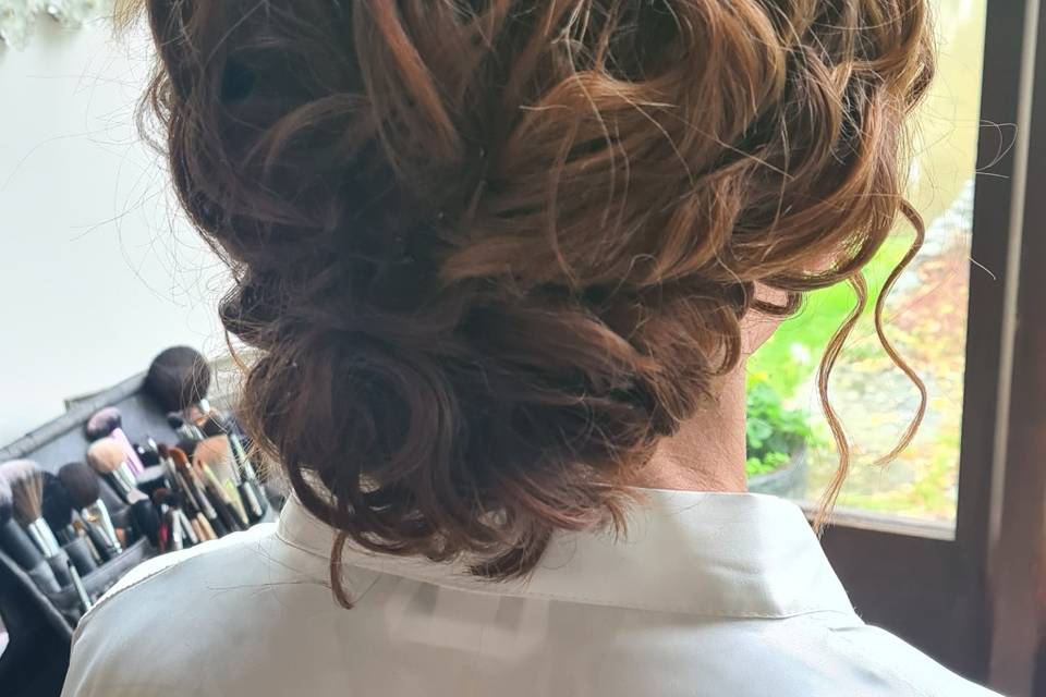 Curly bridal hair up messy bun