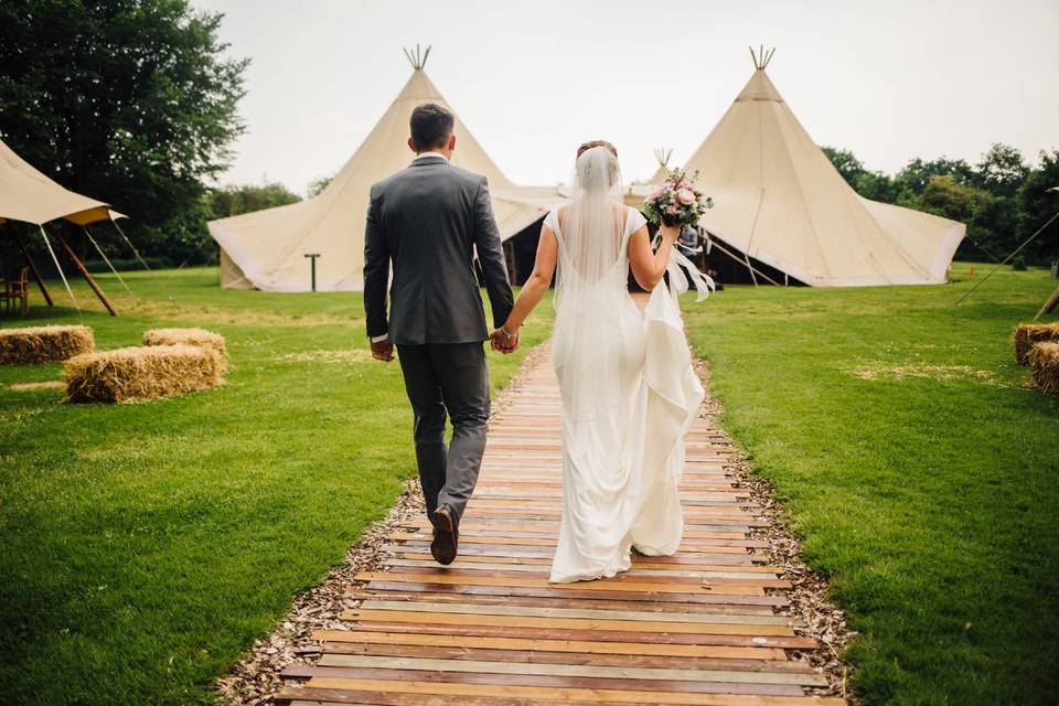 Bride and groom at the tipi
