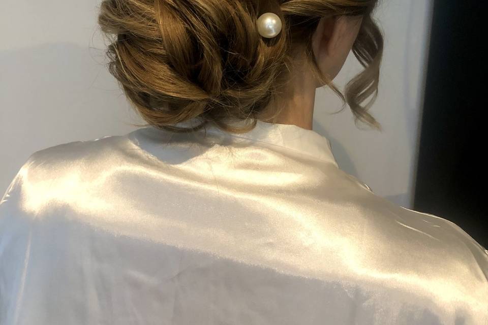 Textured voluminous low bun