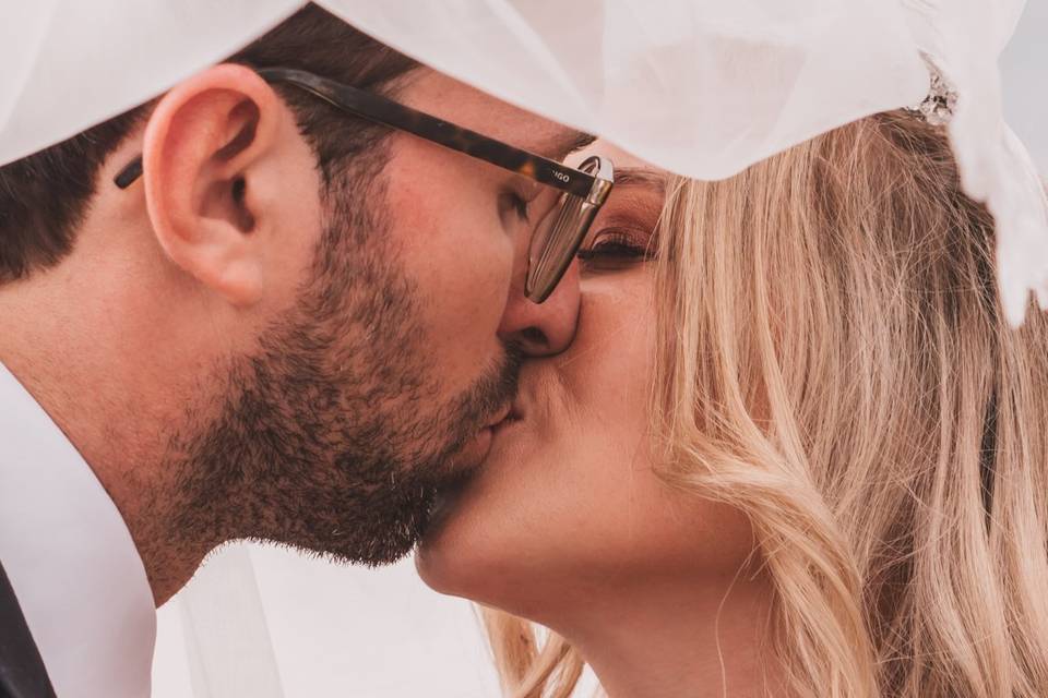 Bride and groom kissing