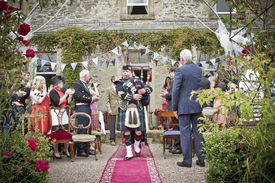 Piper at Rose arch ceremony