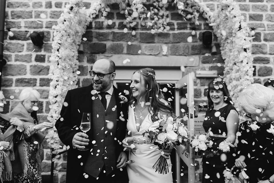 Blossom arch confetti shot