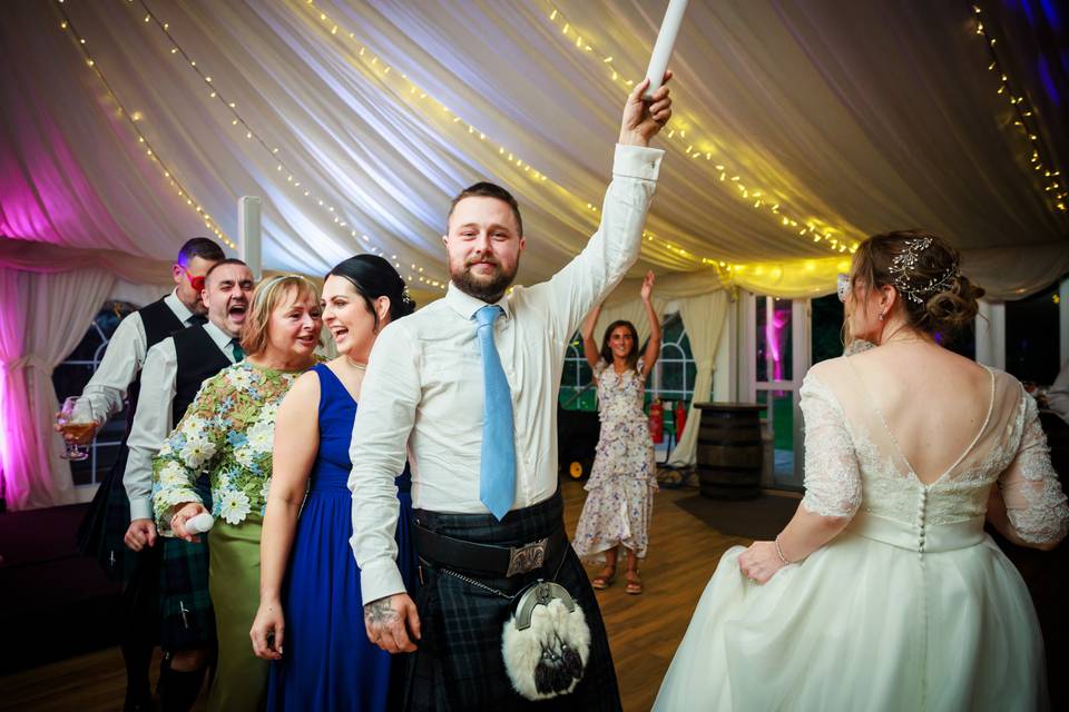 Wedding guests dancing