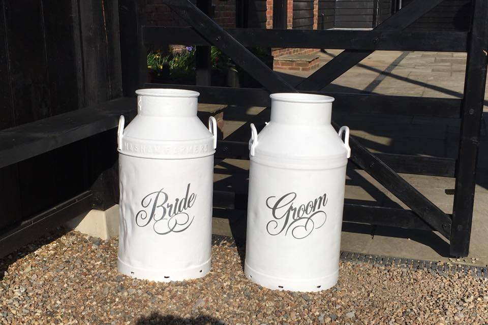 Bride & groom milk churns