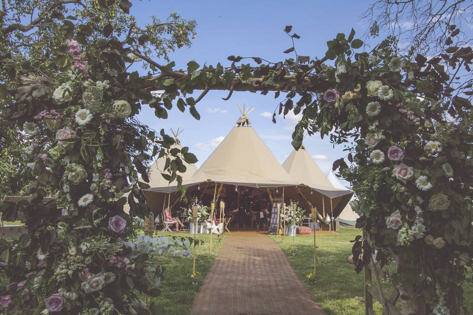 Tipis and floral arches