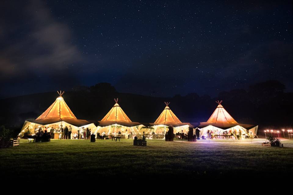 Tipis by night