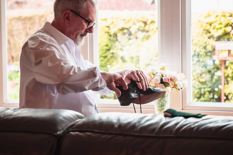 Father of the bride prepping