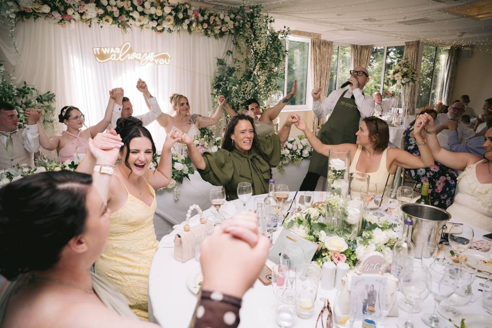 Wedding guests joining in