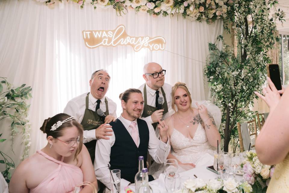 The happy couple posing wi