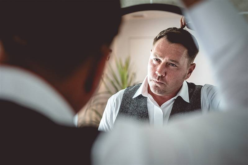 Groom getting ready