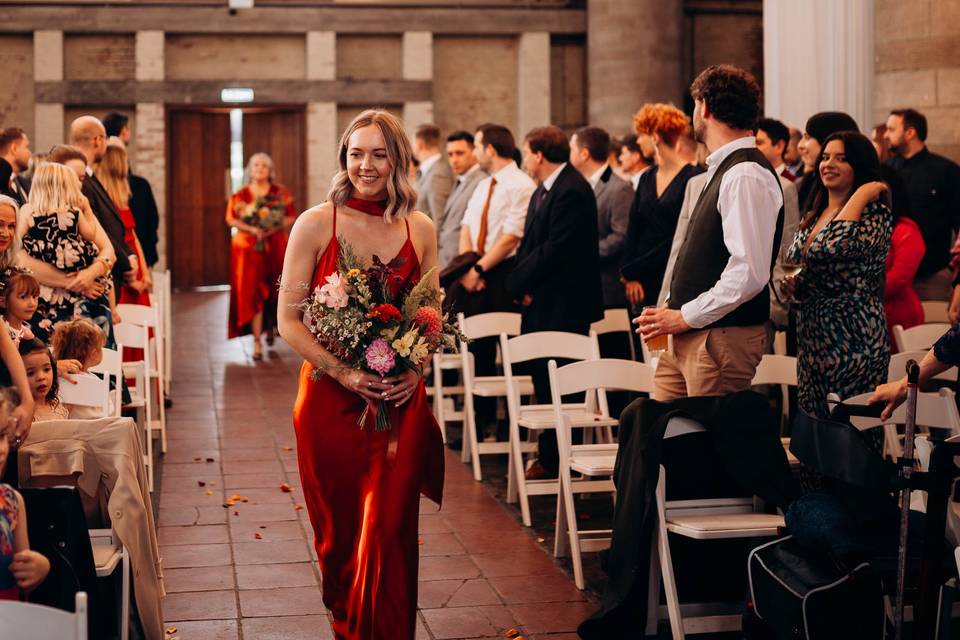 Bridesmaid walking down