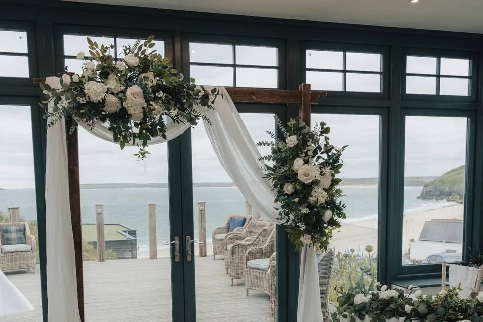 Archway drapes and florals