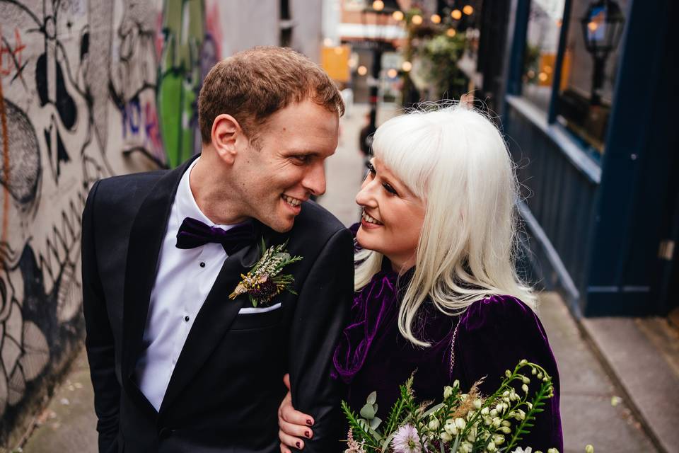 Couple on Christmas steps