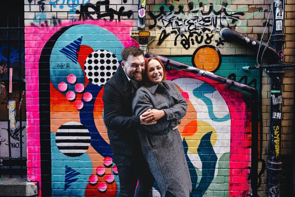 Couple with graffiti