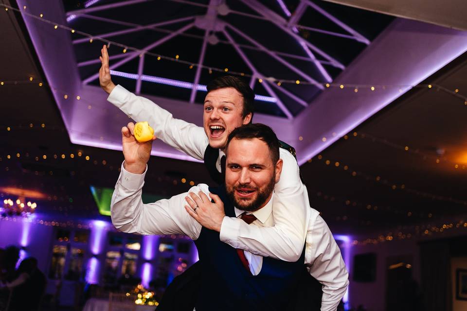 Groomsmen dancing