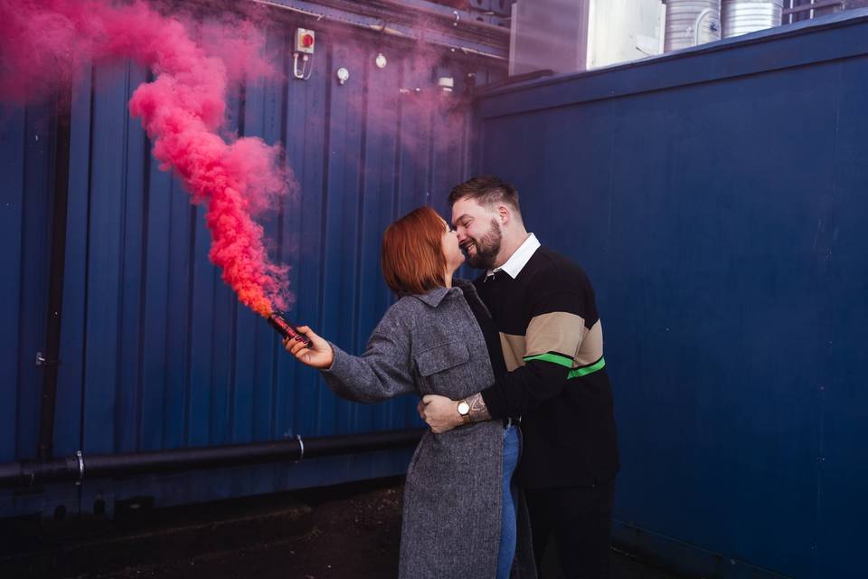 Couple with smoke bomb