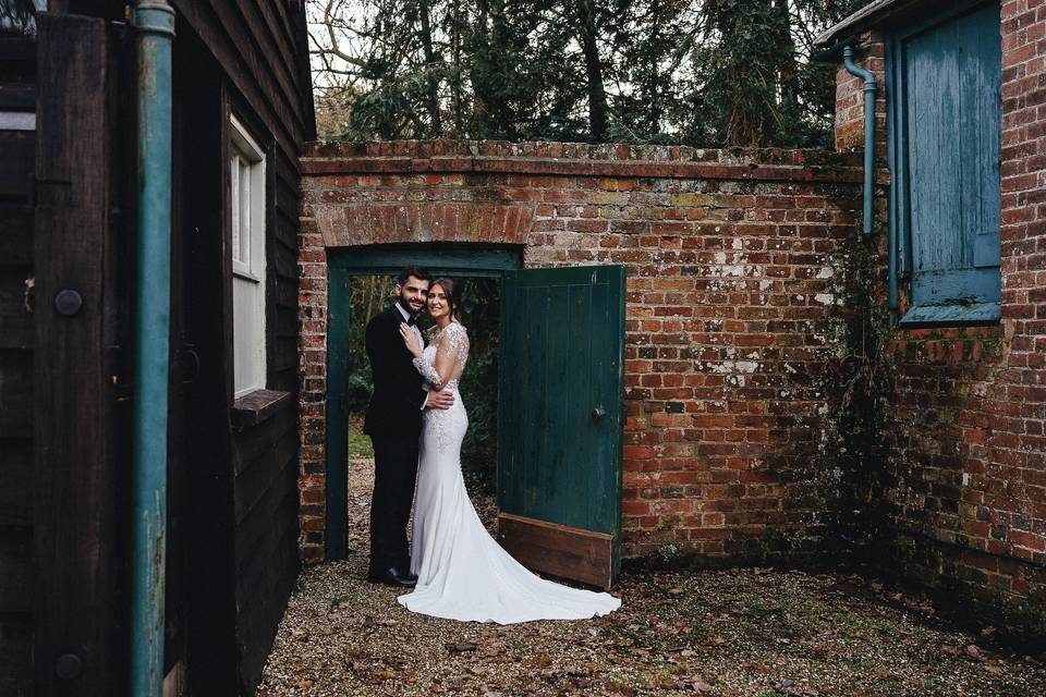 Couple in barn buildings