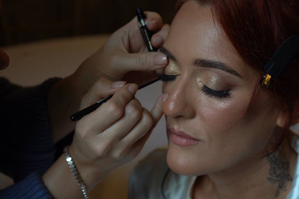 Bride getting makeup done