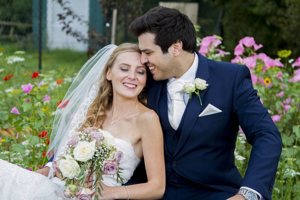 Bride and groom in garden