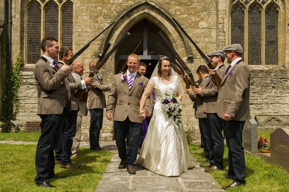 Bride and groom shotgun arch