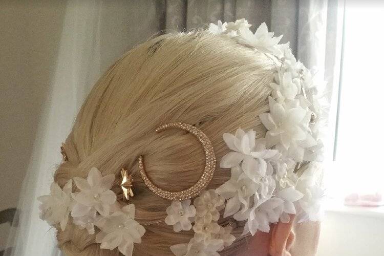 Updo with floral accessories