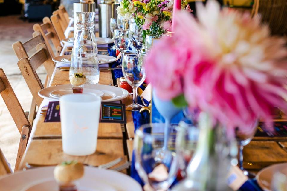 Colourful tipi table settings