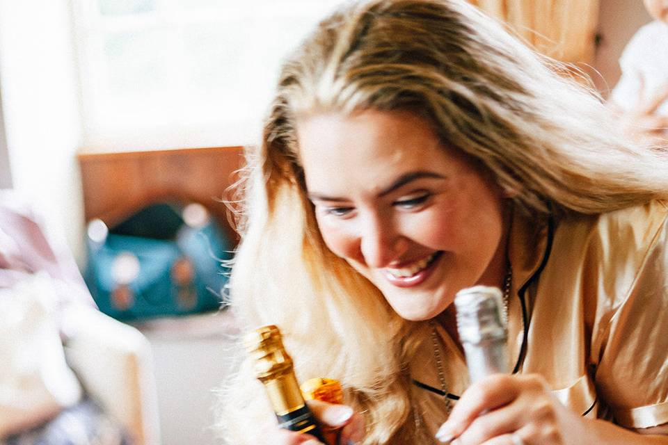 Bride Celebrating with Bubbly