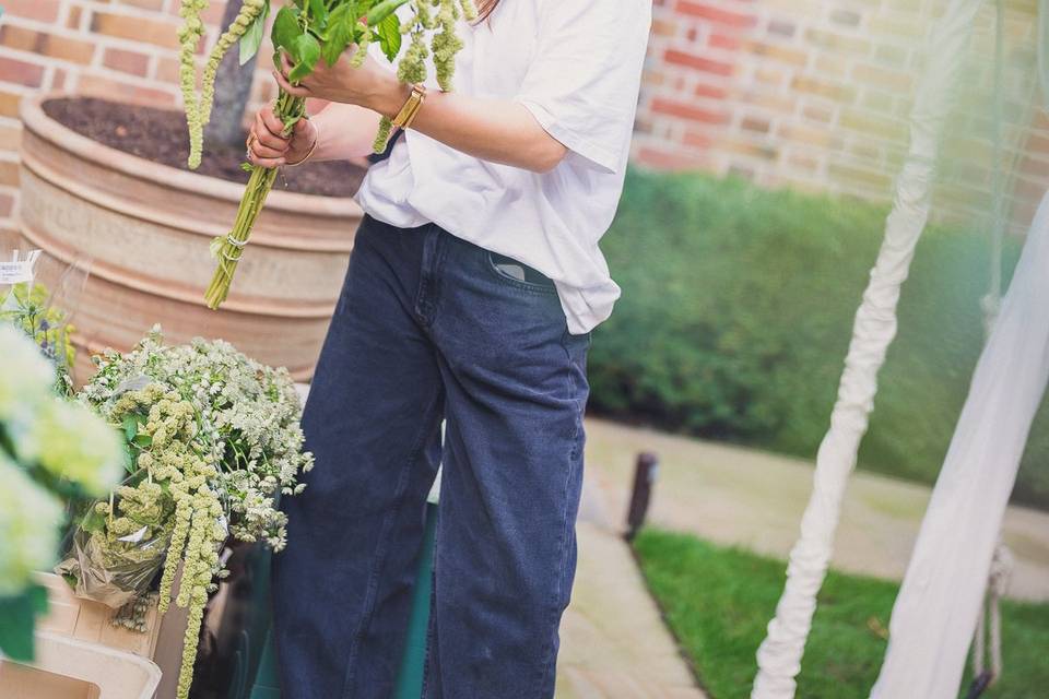 Selecting Flowers at a Wedding