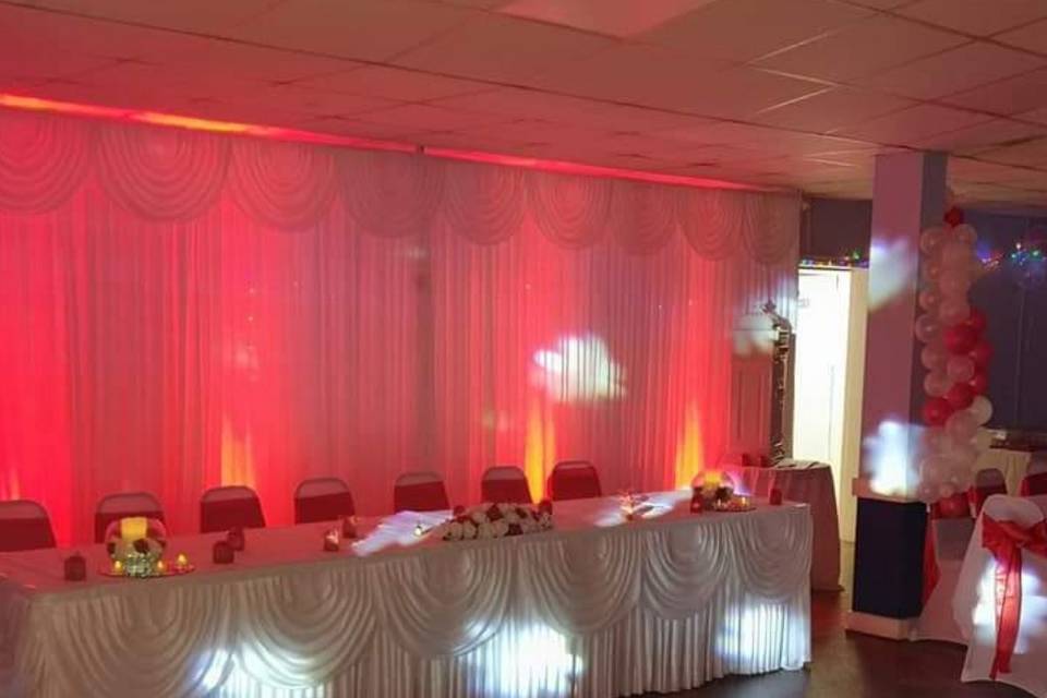 Top table backdrop with swags