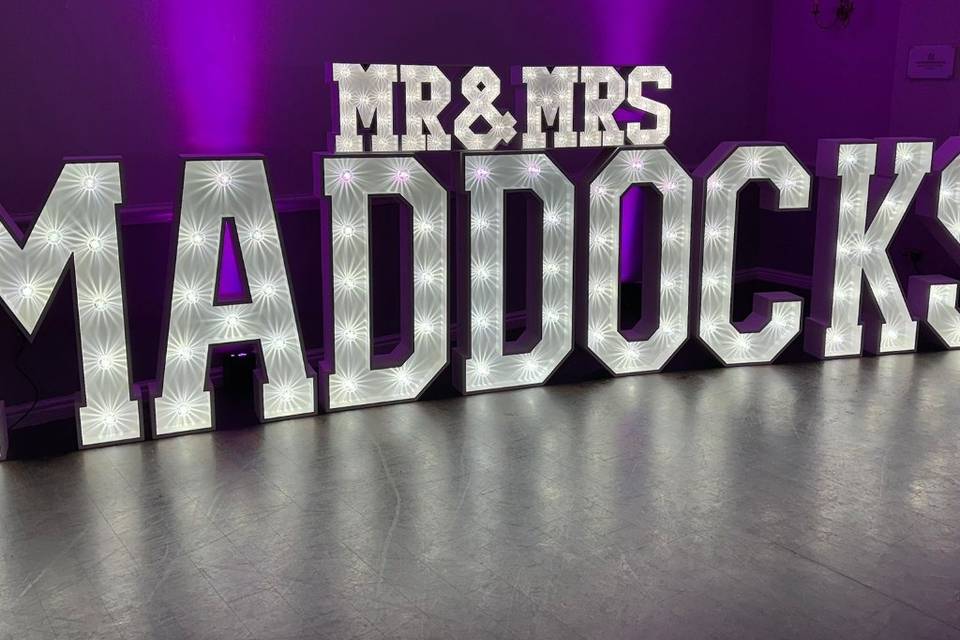 Light up surname with topper