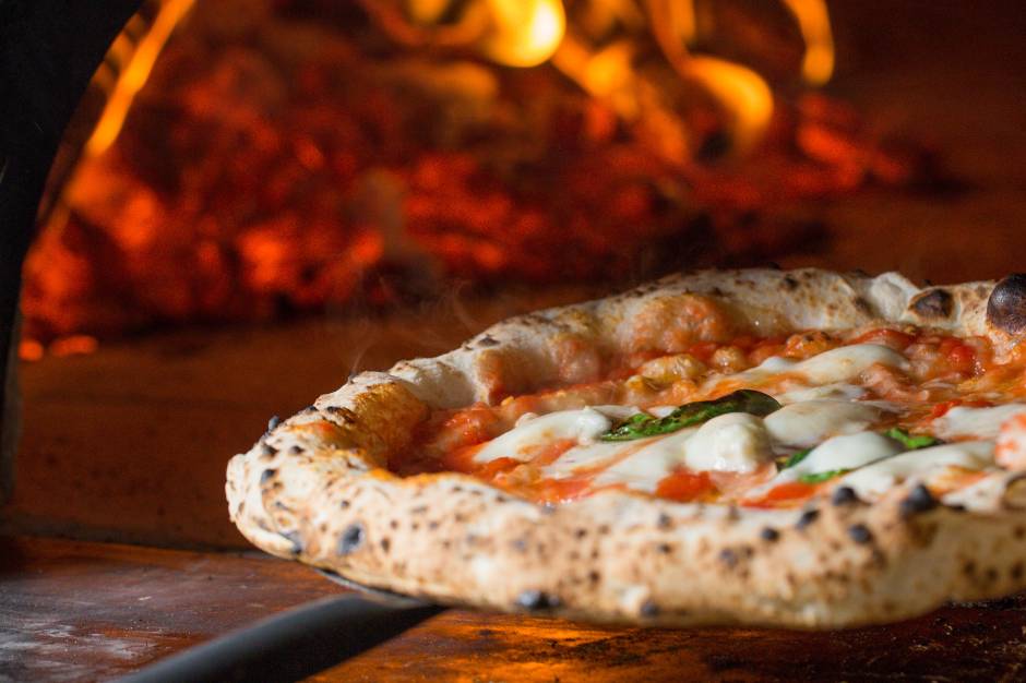 Wood fired cooked pizzas