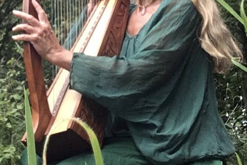 Julie offers harp playing