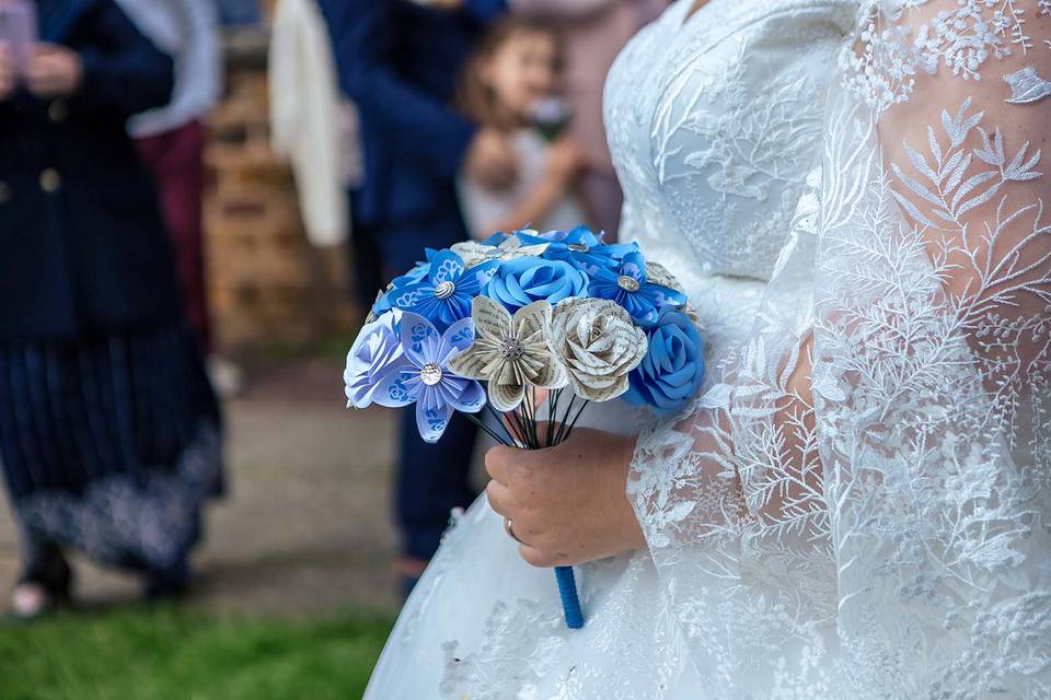 Bride holding bouquet flowers