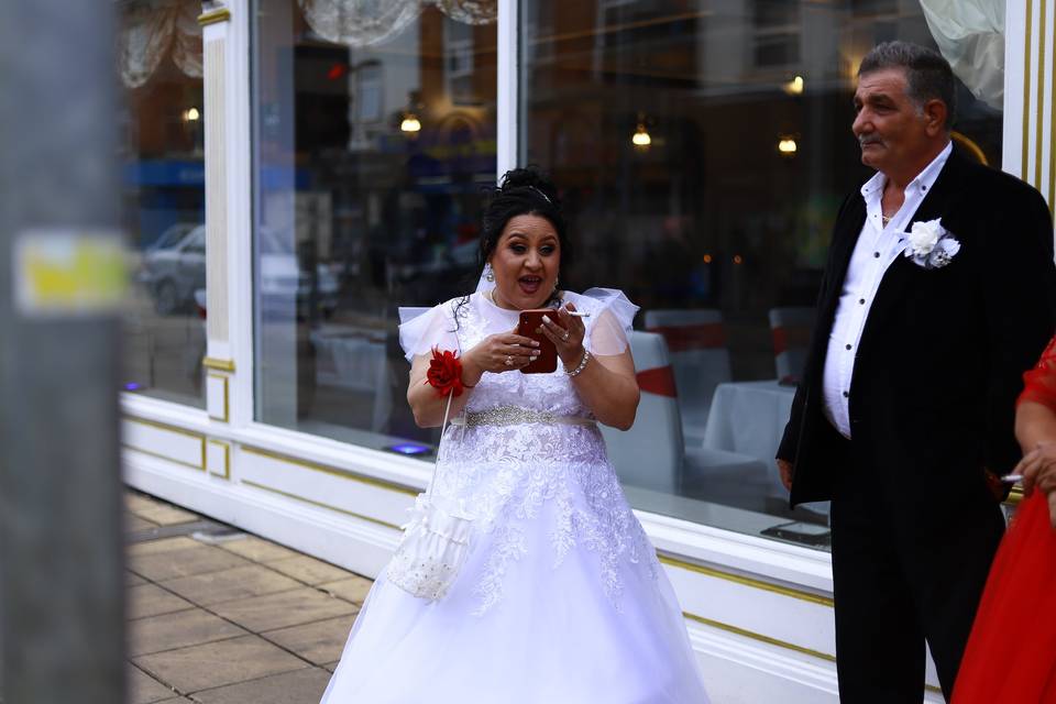 Bride talking at the phone