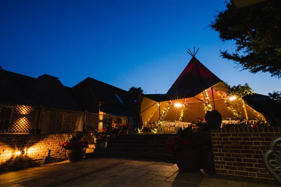 Tipi for ceremony at night